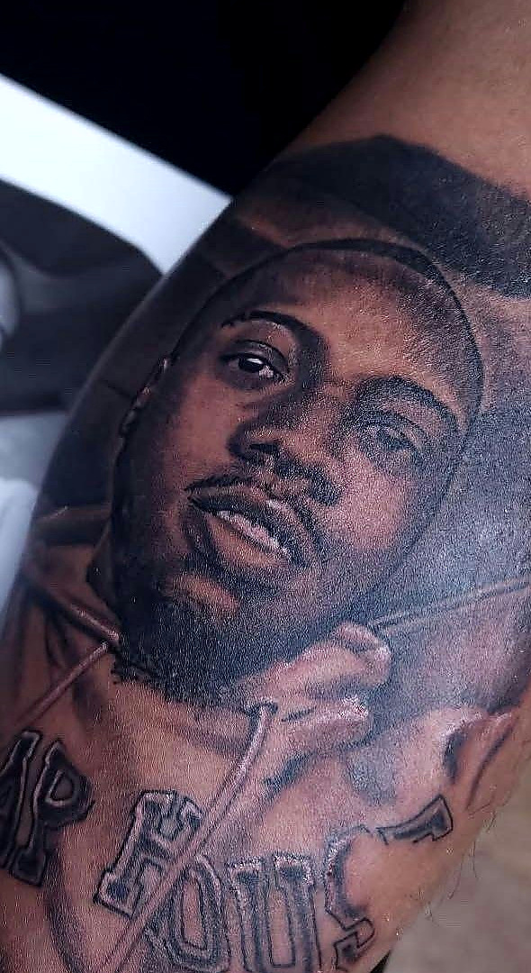 Black and grey portrait tattoo by G Creation Art